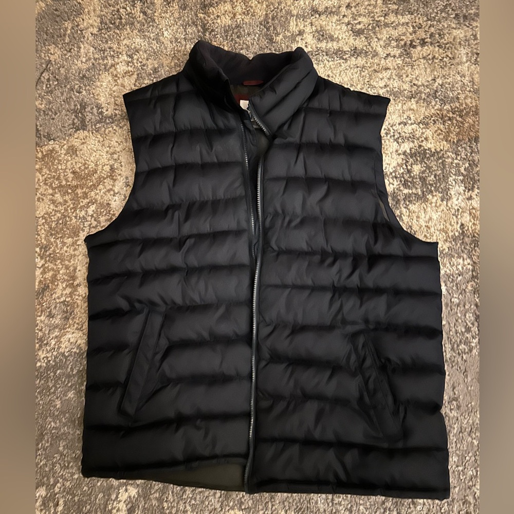 Old navy blackk puffer vest.  Wore a couple times. Like new.